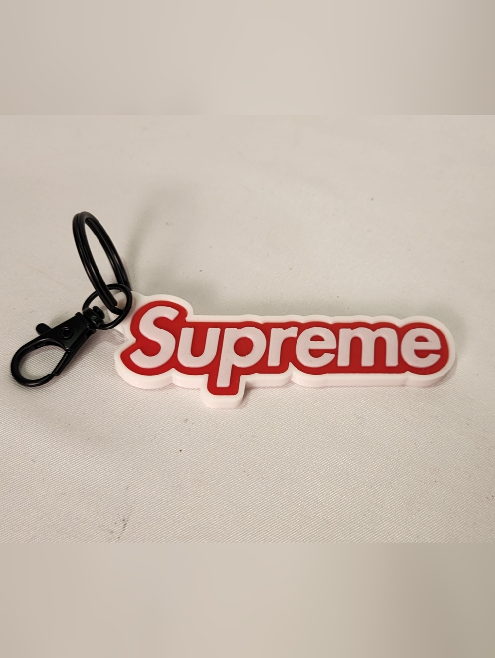 Supreme Red and White Rubber Logo Key Ring